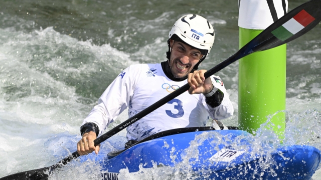 Italy's Giovanni De Gennaro competes in the men's kayak cross time trial canoe slalom competition at Vaires-sur-Marne Nautical Stadium in Vaires-sur-Marne during the Paris 2024 Olympic Games on August 2, 2024. (Photo by Olivier MORIN / AFP)