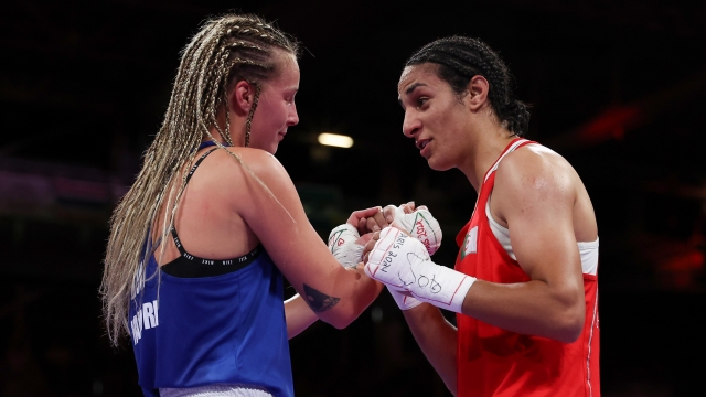 PARIS, FRANCE - AUGUST 03: Imane Khelif of Team Algeria interacts with Anna Luca Hamori of Team Hungary after the Women's 66kg Quarter-final round match on day eight of the Olympic Games Paris 2024 at North Paris Arena on August 03, 2024 in Paris, France. (Photo by Richard Pelham/Getty Images)