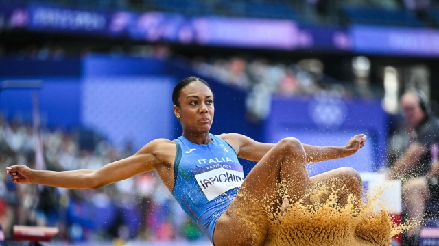 Italy's Larissa Iapichino competes in the women's long jump qualification of the athletics event at the Paris 2024 Olympic Games at Stade de France in Saint-Denis, north of Paris, on August 6, 2024. (Photo by Andrej ISAKOVIC / AFP)