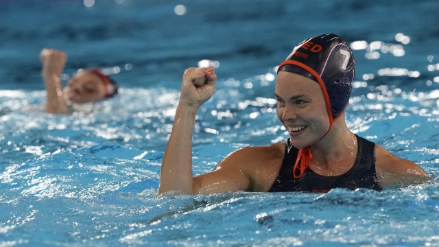 Netherland's Bente Rogge celebrates after scoring during a women's water polo Group A preliminary match between China and the Netherlands at the 2024 Summer Olympics, Monday, July 29, 2024, in Saint-Denis, France. (AP Photo/Luca Bruno)