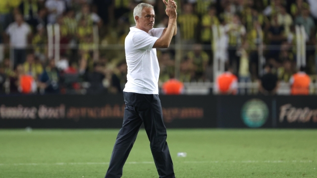 epa11547990 Fenerbahce's head coach Jose Mourinho greets fans after the UEFA Champions League qualifying 3rd round second leg soccer match between Fenerbahce Istanbul and Lille OSC in Istanbul, Turkey, 13 August 2024.  EPA/ERDEM SAHIN