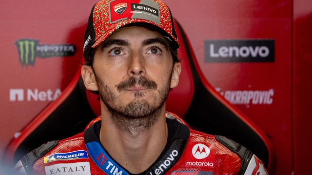 epa11461784 Ducati Lenovo rider Francesco Bagnaia of Italy prepares for the Moto GP Free Practice 2 for the Motorcycling Grand Prix of Germany, at the Sachsenring racetrack in Hohenstein-Ernstthal, Germany, 06 July 2024. The 2024 Motorcycling Grand Prix of Germany is held on the Sachsenring racetrack on 07 July.  EPA/MARTIN DIVISEK