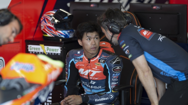 NORTHAMPTON, ENGLAND - AUGUST 02: Ai Ogura of Japan and MT Helmets - MSI looks on in box during the MotoGP Of Great Britain - Free Practice at Silverstone Circuit on August 02, 2024 in Northampton, England. (Photo by Mirco Lazzari gp/Getty Images)