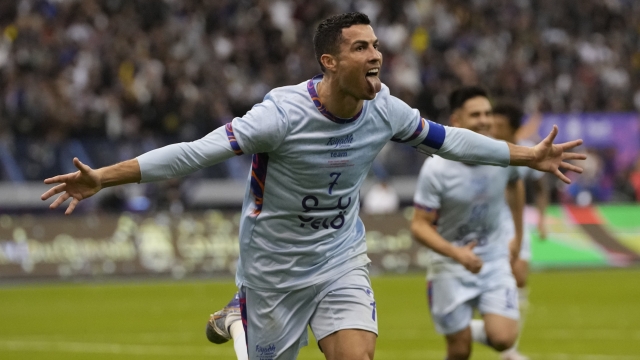 FILE - Cristiano Ronaldo celebrates after scoring his side's second goal playing for a combined XI of Saudi Arabian teams Al Nassr and PSG during a friendly soccer match at the King Saud University Stadium in Riyadh, Saudi Arabia, Jan. 19, 2023. (AP Photo/Hussein Malla, File)