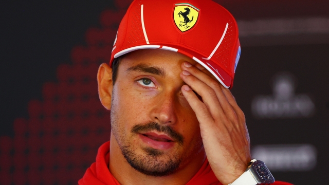 ZANDVOORT, NETHERLANDS - AUGUST 22: Charles Leclerc of Monaco and Ferrari talks to the media in the Paddock during previews ahead of the F1 Grand Prix of Netherlands at Circuit Zandvoort on August 22, 2024 in Zandvoort, Netherlands. (Photo by Clive Rose/Getty Images)