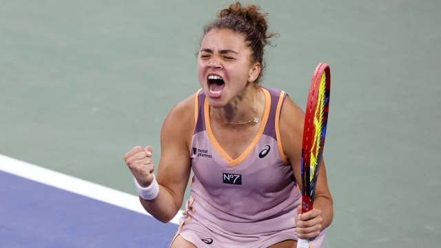 TOPSHOT - Italy's Jasmine Paolini celebrates winning her women's singles first round match against Canada's Bianca Andreescu on day two of the US Open tennis tournament at the USTA Billie Jean King National Tennis Center in New York City, on August 27, 2024. (Photo by Kena Betancur / AFP)