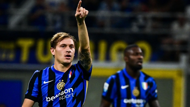 Inter Milan's Italian midfielder #23 Nicolo Barella celebrates after scoring his team's second goal during the Italian Serie A football match between Inter Milan and Atalanta at San Siro Stadium in Milan, Italy on August 30, 2024. (Photo by Piero CRUCIATTI / AFP)