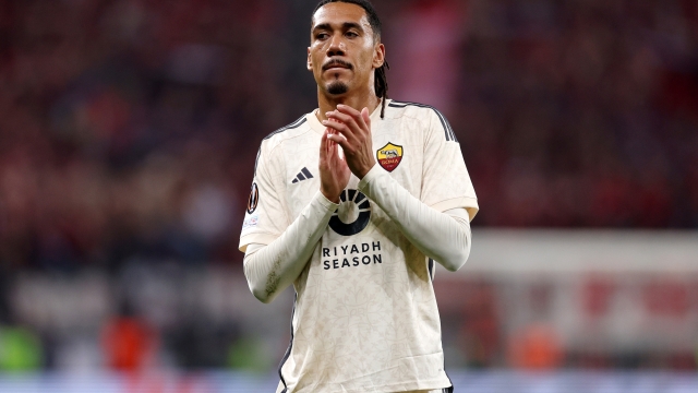 LEVERKUSEN, GERMANY - MAY 09: Chris Smalling of AS Roma shows their appreciation to the fans at full-time following the team's defeat in the UEFA Europa League 2023/24 Semi-Final second leg match between Bayer 04 Leverkusen and AS Roma at BayArena on May 09, 2024 in Leverkusen, Germany. (Photo by Dean Mouhtaropoulos/Getty Images)
