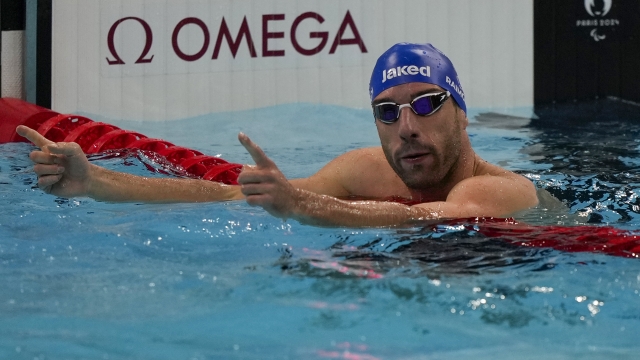 Italy's Stefano Raimondi celebrates after winning the men's 100 m. freestyle S10 during the 2024 Paralympics, Sunday, Sept. 1, 2024, in Paris, France. (AP Photo/Michel Euler)