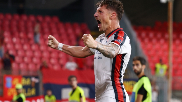 MONZA, ITALY - AUGUST 24: Andrea Pinamonti of Genoa CFC celebrates after scoring his team's first goal during the Serie match between Monza and Genoa at U-Power Stadium on August 24, 2024 in Monza, Italy. (Photo by Francesco Scaccianoce/Getty Images)