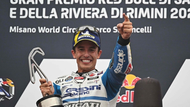 Gresini Racing MotoGP's Spanish rider Marc Marquez celebrates on the podium after winning the San Marino MotoGP at the Misano World Circuit Marco-Simoncelli in Misano Adriatico on September 8, 2024. (Photo by Gabriel BOUYS / AFP)