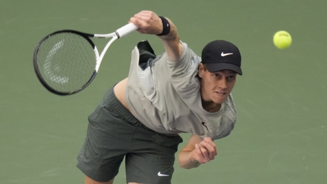 Jannik Sinner, of Italy, serves to Taylor Fritz, of the United States, during the men's singles final of the U.S. Open tennis championships, Sunday, Sept. 8, in New York. 2024. (AP Photo/Frank Franklin II)