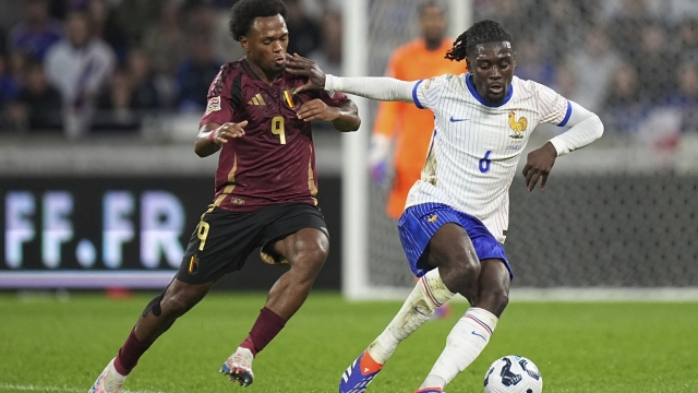 France's Manu Kone, right, and Belgium's Lois Openda fight for the ball during the UEFA Nations League soccer match between France and Belgium at the Groupama stadium in Decines, outside Lyon, France, Monday, Sept. 9, 2024. (AP Photo/Laurent Cipriani)    Associated Press / LaPresse Only italy and Spain