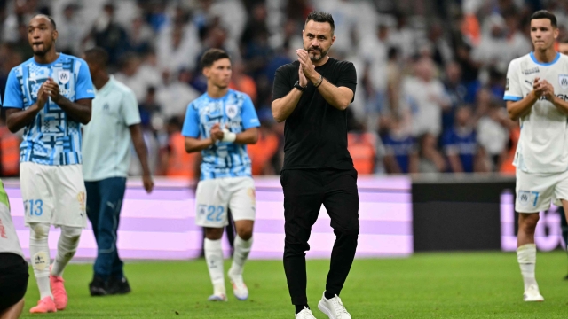 Marseille's Italian headcoach Roberto De Zerbi reacts at the end of the French L1 football match between Olympique Marseille (OM) and Stade de Reim at Stade Velodrome in Marseille, southern France on August 25, 2024. (Photo by Miguel MEDINA / AFP)