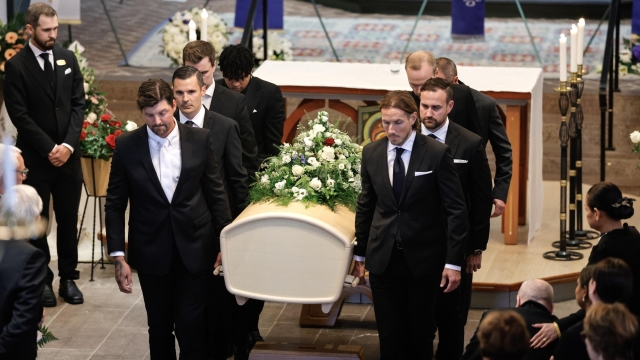 epa11601549 Guests carry the coffin during the funeral service of late Swedish soccer manager Sven-Goran Eriksson inside the Fryksande Church, in Torsby, Sweden, 13 September 2024. Swedish football coach Sven-Goran Eriksson died on 26 August 2024 at the age of 76.  EPA/ADAM IHSE  SWEDEN OUT