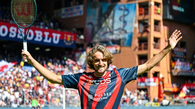 GENOA, ITALY - SEPTEMBER 15: Stefanos Tsitsipas, tennis player and Genoa fan, greets the crowd prior to kick-off in the Serie A match between Genoa CFC and AS Roma at Stadio Luigi Ferraris on September 15, 2024 in Genoa, Italy. (Photo by Getty Images/Getty Images)