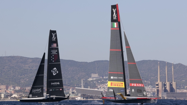 epa11603823 Luna Rossa (R) of Italy and American Magic of US compete in the Louis Vuitton Cup Semi-Finals within the America's Cup sailing competition, in Barcelona, Spain, 14 September 2024.  EPA/Toni Albir