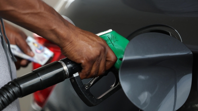 epa11548367 A customer fills his petrol tank at a petrol station in London, Britain, 14 August 2024. UK Inflation has risen to 2.2 percent driven by an increase in energy costs, the Office for National Statistics (ONS) has reported. The Bank of England had anticipated a rise of 2.3 percent.  EPA/ANDY RAIN