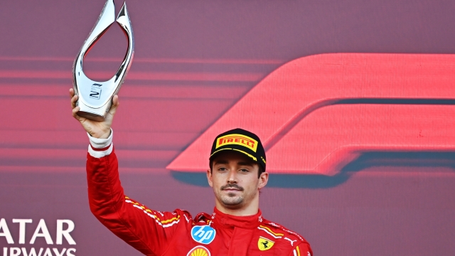 BAKU, AZERBAIJAN - SEPTEMBER 15: Second placed Charles Leclerc of Monaco and Ferrari celebrates on the podium during the F1 Grand Prix of Azerbaijan at Baku City Circuit on September 15, 2024 in Baku, Azerbaijan. (Photo by James Sutton/Getty Images)