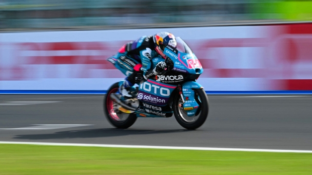 CFMOTO Aspar Team's Colombian rider David Alonso competes during the Moto3 class race of the MotoGP Pramac Emilia-Romagna Grand Prix at the Misano World Circuit Marco-Simoncelli in Misano Adriatico, on September 22, 2024. (Photo by Andreas SOLARO / AFP)