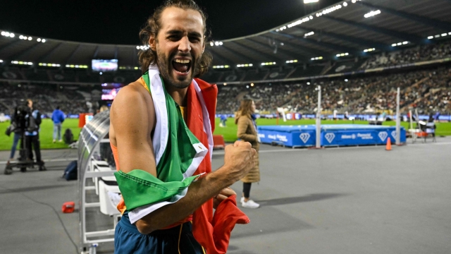 Italy's Gianmarco Tamberi celebrates after winning the Men's High Jump final of the Memorial Van Damme Diamond League athletics finals at the Roi Baudouin Stadium in Brussels on September 14, 2024. (Photo by NICOLAS TUCAT / AFP)