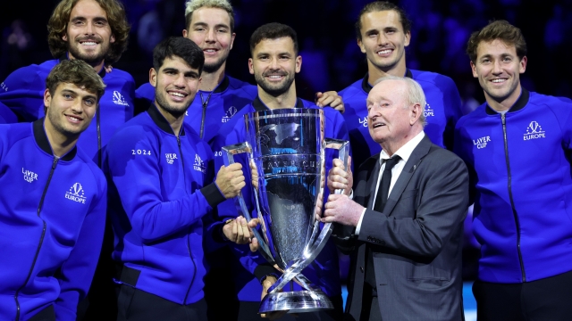 BERLIN, GERMANY - SEPTEMBER 22: Flavio Cobolli, Stefanos Tsitsipas, Carlos Alcaraz, Jan-Lennard Struff, Grigor Dimitrov, Alexander Zverev and Casper Ruud of Team Europe celebrate with the Laver Cup trophy along with Rod Laver after Team Europe win the Laver Cup on day three of the Laver Cup at Uber Arena on September 22, 2024 in Berlin, Germany. (Photo by Clive Brunskill/Getty Images for Laver Cup)