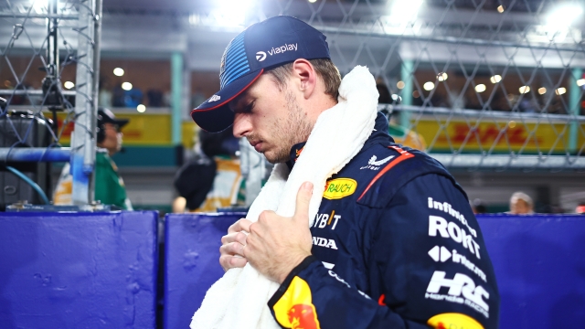 SINGAPORE, SINGAPORE - SEPTEMBER 22: Max Verstappen of the Netherlands and Oracle Red Bull Racing prepares on the grid prior to the F1 Grand Prix of Singapore at Marina Bay Street Circuit on September 22, 2024 in Singapore, Singapore. (Photo by Mark Thompson/Getty Images)