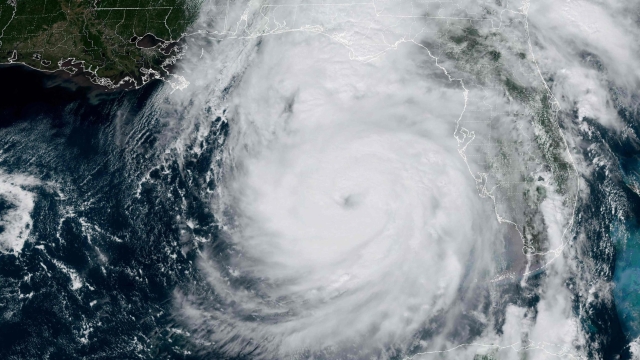 TOPSHOT - This image obtained from the National Oceanic and Atmospheric Administration (NOAA) shows Hurricane Helene on September 26, 2024, at 17:51 UTC. Parts of Florida face "unsurvivable" conditions when Hurricane Helene hits later Thursday, the US weather service said, warning that howling wind will drive destructive waves and storm surge as high as 20 feet (six meters) onto the low-lying coast. Residents heeded mass evacuation orders and fled ahead of the incoming hurricane -- projected to be one of the largest Gulf of Mexico storms in decades. (Photo by Handout / NOAA/GOES / AFP) / RESTRICTED TO EDITORIAL USE - MANDATORY CREDIT "AFP PHOTO / NOAA/GOES" - NO MARKETING NO ADVERTISING CAMPAIGNS - DISTRIBUTED AS A SERVICE TO CLIENTS