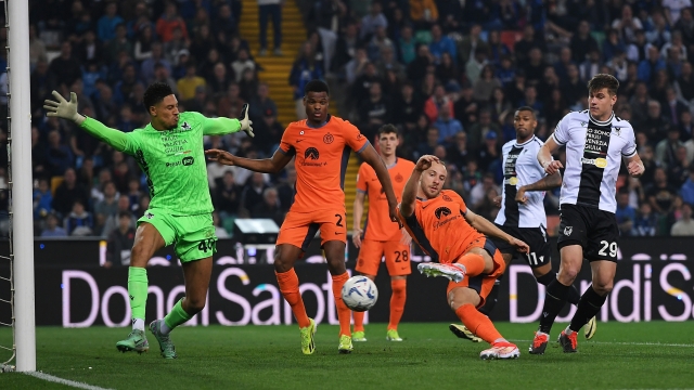 UDINE, ITALY - APRIL 08: Carlos Augusto of FC Internazionale scores a goal past Maduka Okoye of Udinese Calcio that is later disallowed for offside during the Serie A TIM match between Udinese Calcio and FC Internazionale at Dacia Arena on April 08, 2024 in Udine, Italy. (Photo by Alessandro Sabattini/Getty Images)