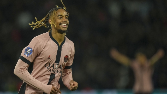 PSG\'s Bradley Barcola celebrates after scoring his side\'s opening goal during the French League One soccer match between Paris Saint-Germain and Rennes at the Parc des Princes in Paris, Friday, Sept. 27, 2024. (AP Photo/Thibault Camus)   Associated Press / LaPrersse Only italy and Spain