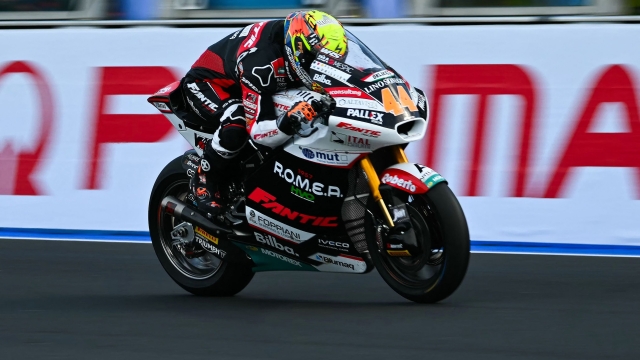 Fantic Racing's Spanish rider Aron Canet competes during the Moto2 class race of the MotoGP Pramac Emilia-Romagna Grand Prix at the Misano World Circuit Marco-Simoncelli in Misano Adriatico, on September 22, 2024. (Photo by Andreas SOLARO / AFP)