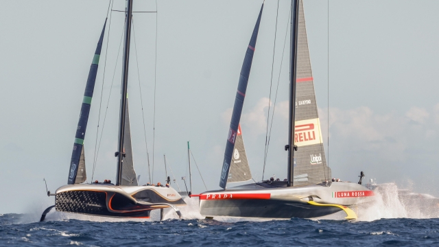 epa11632395 Teams INEOS Britannia (L) and Prada Luna Rossa Pirelli (L) compete during Day 3 of the 2024 Louis Vuitton Cup final in Barcelona, Spain, 29 September 2024. The winner of the Louis Vuitton Cup sailing competition determines the challenger in the 37th America's Cup to be held in October.  EPA/Quique Garcia