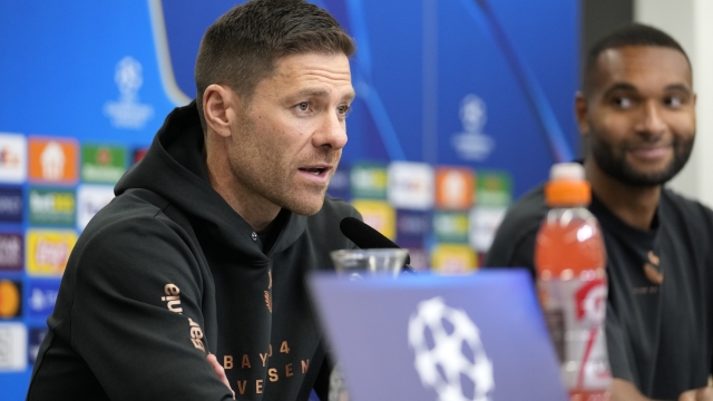 Leverkusen's head coach Xabi Alonso talks to the media at a press conference ahead of the Champions League opening phase soccer match between Bayer Leverkusen and AC Milan in Leverkusen, Monday, Sept. 30, 2024. (AP Photo/Martin Meissner)