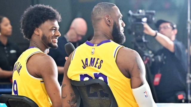 Los Angeles Lakers #23 LeBron James and his son #9 Bronny James attend the Lakers media day at UCLA Health Training Center in El Segundo, California, September 30, 2024. (Photo by Frederic J. BROWN / AFP)