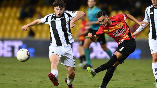 BENEVENTO, ITALY - SEPTEMBER 30: Federico Macca of Juventus Next Gen battles for possession with Antonio Prisco of Benevento during the Serie C match between Benevento and Juventus Next Gen at Stadio Ciro Vigorito on September 30, 2024 in Benevento, Italy. (Photo by Juventus FC/Juventus FC via Getty Images)