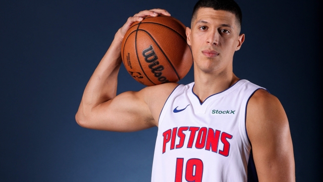 DETROIT, MICHIGAN - SEPTEMBER 30: Simone Fontecchio #19 of the Detroit Pistons poses for a portrait during media day at Little Caesars Arena on September 30, 2024 in Detroit, Michigan. NOTE TO USER: User expressly acknowledges and agrees that, by downloading and or using this photograph, User is consenting to the terms and conditions of the Getty Images License.   Gregory Shamus/Getty Images/AFP (Photo by Gregory Shamus / GETTY IMAGES NORTH AMERICA / Getty Images via AFP)