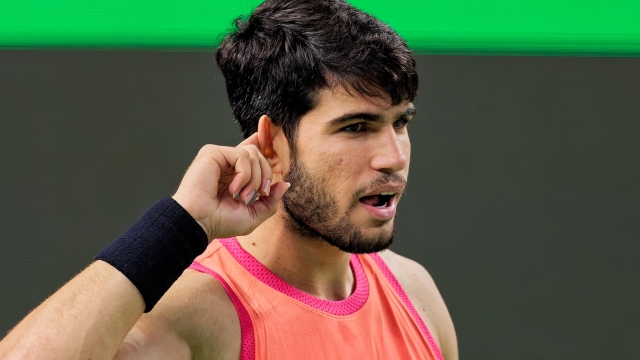 epa11642825 Carlos Alcaraz of Spain reacts during his Men's Singles match against Juncheng Shang of China at the Shanghai Masters tennis tournament in Shanghai, China, 05 October 2024.  EPA/ALEX PLAVEVSKI