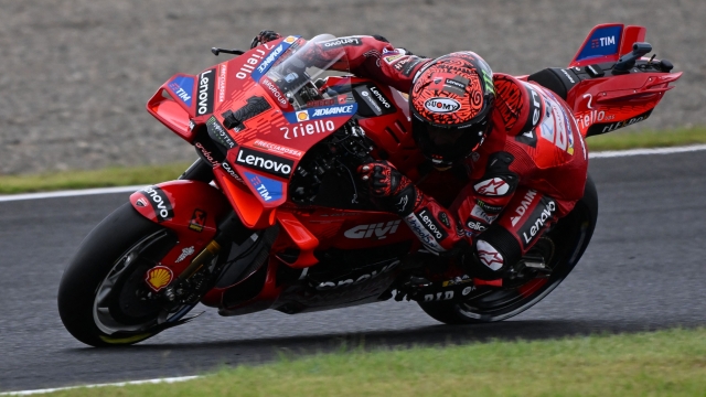 Ducati Lenovo Team rider Francesco Bagnaia of Italy rides his motorcycle during the MotoGP class qualifying session of MotoGP Japanese Grand Prix at the Mobility Resort Motegi in Motegi, Tochigi prefecture on October 5, 2024. (Photo by Toshifumi KITAMURA / AFP)