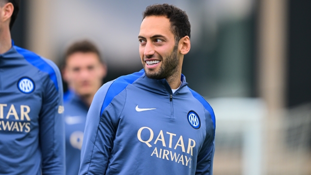 COMO, ITALY - OCTOBER 02: Hakan Calhanoglu of FC Internazionale smiles during the FC Internazionale training session at BPER Training Centre at Appiano Gentile on October 02, 2024 in Como, Italy. (Photo by Mattia Pistoia - Inter/Inter via Getty Images)