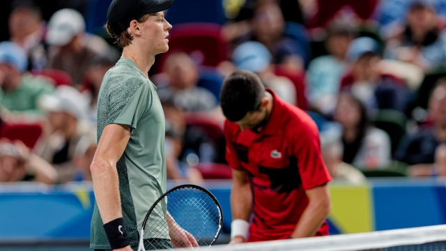 epa11656947 Jannik Sinner of Italy (L) reacts during his Men's Singles Final match against Novak Djokovic of Serbia at the Shanghai Masters tennis tournament in Shanghai, China, 13 October 2024.  EPA/ALEX PLAVEVSKI