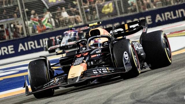 epa11619425 Mexican driver Sergio Perez of Red Bull Racing in action during the Singapore Formula One Grand Prix at the Marina Bay Street Circuit, Singapore, 22 September 2024.  EPA/TOM WHITE