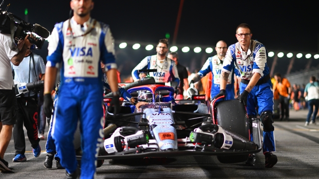 SINGAPORE, SINGAPORE - SEPTEMBER 22: Daniel Ricciardo of Australia and Visa Cash App RB arrives onto the grid prior to the F1 Grand Prix of Singapore at Marina Bay Street Circuit on September 22, 2024 in Singapore, Singapore. (Photo by Rudy Carezzevoli/Getty Images)