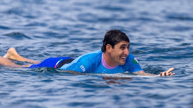 Leonardo Fioravanti of Team Italy reacts during round one of surfing on day one of the Olympic Games Paris 2024 at  on July 27, 2024 in Teahupo'o, French Polynesia. (Photo by Ed Sloane / POOL / AFP)