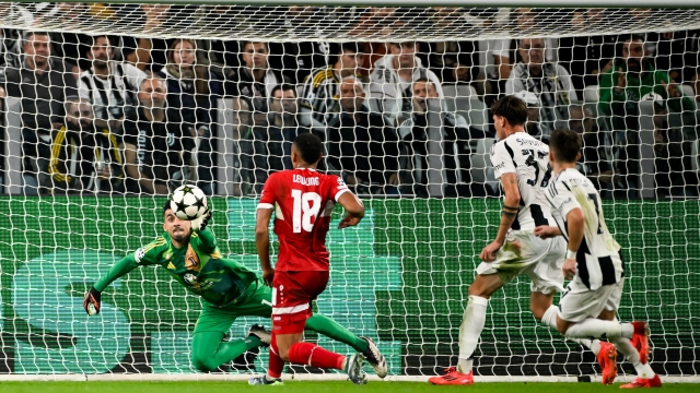 TURIN, ITALY - OCTOBER 22: Jamie Leweling of VfB Stuttgart shoots attempting to score and Juventus goalkeeper Mattia Perin saves during the UEFA Champions League 2024/25 League Phase MD3 match between Juventus and VfB Stuttgart at Juventus Stadium on October 22, 2024 in Turin, Italy. (Photo by Daniele Badolato - Juventus FC/Juventus FC via Getty Images)