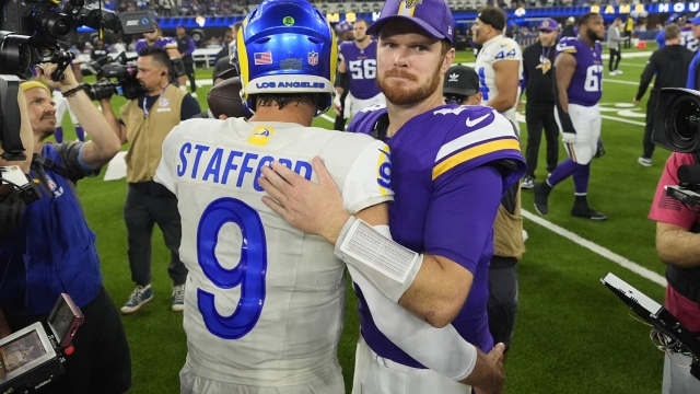 Los Angeles Rams quarterback Matthew Stafford (9) and Minnesota Vikings quarterback Sam Darnold, center right, hug after an NFL football game, Thursday, Oct. 24, 2024, in Inglewood, Calif. (AP Photo/Mark J. Terrill)