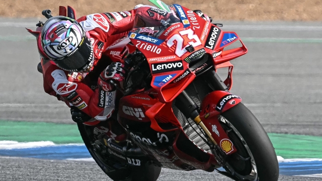 Ducati Lenovo Team's Italian rider Enea Bastianini rides in the Tissot Sprint race during the MotoGP Thailand Grand Prix at the Buriram International Circuit in Buriram on October 26, 2024. (Photo by Lillian SUWANRUMPHA / AFP)