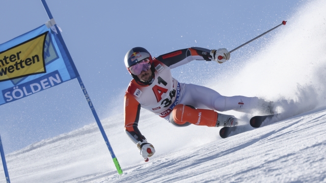 Netherland's Marcel Hirscher speeds down the course during an alpine ski, men's World Cup giant slalom, in Soelden, Austria, Sunday, Oct. 27, 2024. (AP Photo/Marco Trovati)