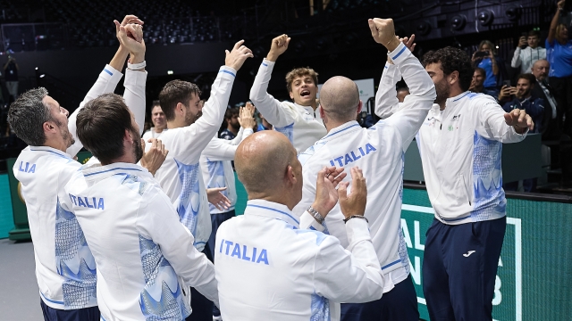 BOLOGNA, ITALY - SEPTEMBER 15: Italy team celebrate Road to Malaga in the final during the 2024 Davis Cup Finals Group Stage Bologna match between Italy and Netherlands at Unipol Arena on September 15, 2024 in Bologna, Italy. (Photo by Emmanuele Ciancaglini/Getty Images for ITF)