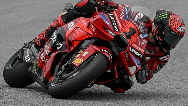 Ducati Lenovo Team's Italian rider Francesco Bagnaia rides during the qualifying session of the MotoGP Malaysian Grand Prix at the Sepang International Circuit in Sepang on November 2, 2024. (Photo by Lillian SUWANRUMPHA / AFP)