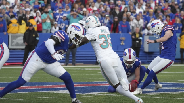 Buffalo Bills place kicker Tyler Bass (2) kicks the game winning field goal during the second half of an NFL football game against the Miami Dolphins, Sunday, Nov. 3, 2024, in Orchard Park, N.Y. (AP Photo/Gene Puskar)